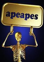 apeapes ord och gyllene skelett foto