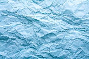 blå skrynkligt papper bakgrund med abstrakt sömlösa mönster. skrynklig pappersstruktur. foto