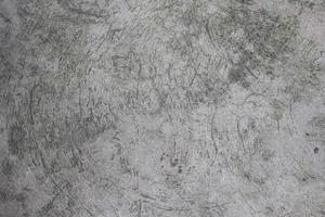 grå cement och scratch bakgrund, grov yta betong bakgrund. foto