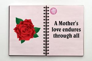 glad mors dag med citat skrivet inuti en öppen anteckningsbok. foto