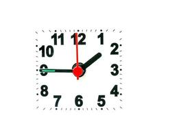 klocka som visar tid på en vit bakgrund foto
