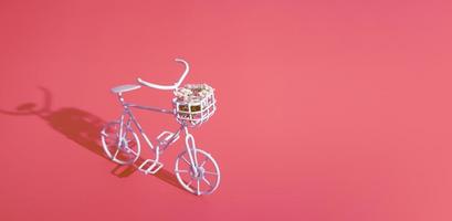 en cykel med blommor åker en solig dag. mall för ett gratulationskort för mors dag, vår och sommarlov foto