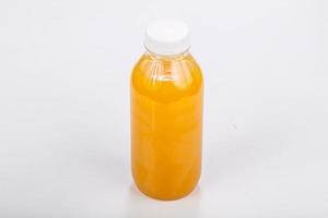 apelsin färskgjord juiceflaska foto
