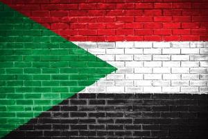 sudan flagga vägg textur bakgrund foto