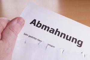 abmahnung är ett tyskt upphöra-och-avstå-brev foto