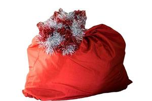 jultomten röd väska, isolerad på vit bakgrund. foto