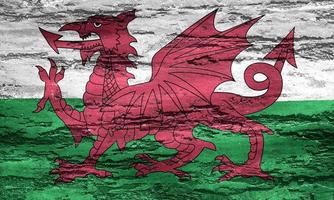 wales flagga - realistiskt viftande tygflagga foto