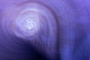 abstrakt spiral bakgrund i blå lila toner. foto