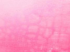 sprucken och skalar målade rosa betong textur bakgrund foto