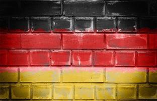 Tysklands nationella flagga avbildad på en tegelvägg foto