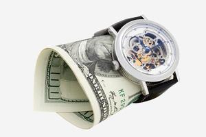 klocka och pengar närbild. tid är pengar koncept