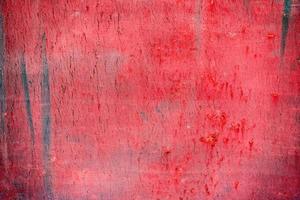 grov rödmålad rostig metallyta, högupplöst struktur foto