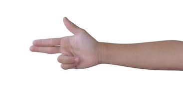 barn hand att göra skjutpistol, gest på isolerade vit bakgrund. hand pekar med två fingrar. foto