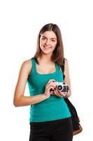 ung kaukasisk kvinna med kamera isolerade över vit bakgrund foto