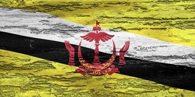 brunei flagga - realistiskt viftande tygflagga foto