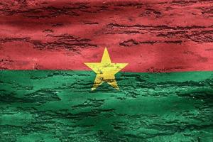 burkina faso flagga - realistisk viftande tygflagga foto