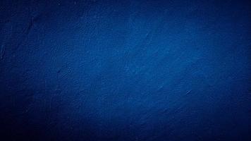 mörkblå grungy abstrakt cement betongvägg textur bakgrund foto