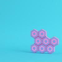 abstrakta hexagoner med paddlar på klarblå bakgrund i pastellfärger foto