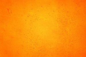 orange abstrakt bakgrundsstruktur. blank för design, mörkorange kanter foto