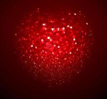 röd oskärpa hjärta form av ljus bokeh på en svart bakgrund foto