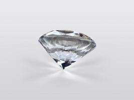 glänsande briljant diamant placerad på grå bakgrund foto