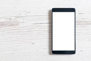 svart smart telefon med isolerad skärm foto