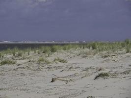 strand och sanddyner på ön spiekeroog foto