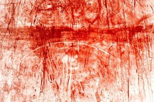 röd bakgrund, skrämmande blodig vägg. vit vägg med blodstänk för halloween bakgrund. foto