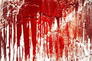 läskig blodig vägg. vit vägg med blodstänk för halloween bakgrund. foto