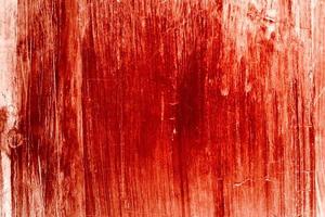 röd bakgrund, skrämmande blodig vägg. vit vägg med blodstänk för halloween bakgrund. foto