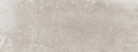 vacker cement bakgrund pastellfärg. beige betongstruktur. högupplöst grunge horisontell bakgrund foto