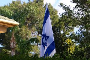 israelisk blåvit flagga med Davids stjärna foto