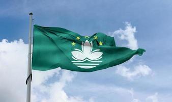 macao flagga - realistiskt viftande tygflagga. foto