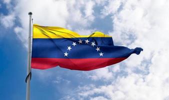 3D-illustration av en Venezuelas flagga - realistiskt viftande tygflagga.. foto