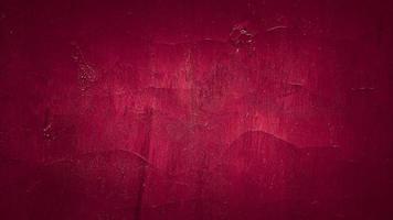 mörk grungy röd abstrakt målad betongvägg textur bakgrund foto