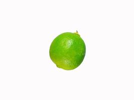 grön citron frukt på en vit bakgrund foto