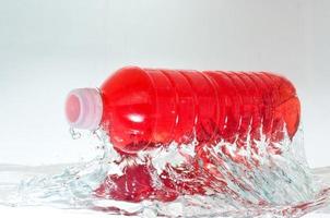 röd flaskdryck foto