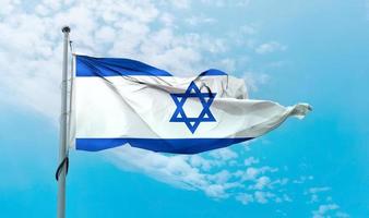 Israels flagga - realistiskt viftande tygflagga. foto