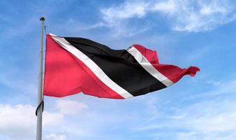 3D-illustration av en trinidad och tobago flagga - realistiska viftande tyg flagga. foto