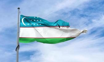 3D-illustration av en uzbekistan flagga - realistiska viftande tygflagga. foto
