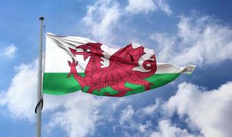 wales flagga - realistiskt viftande tygflagga. foto