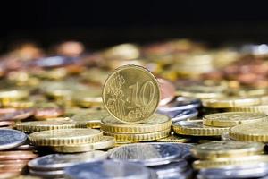 euro och oss cent foto