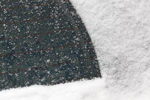 snö på bilen foto