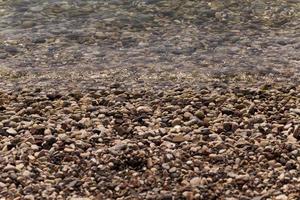 strand. närbild. Adriatiska havet foto