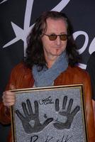 los angeles, 20 nov - geddy lee of rush vid ceremonin där rush tas in på guitar Centers rockwalk på guitar Center den 20 november 2012 i los angeles, ca. foto