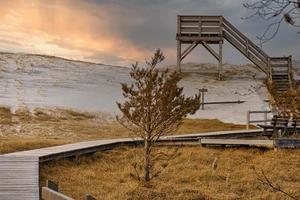 solnedgång vid utsiktstornet vid den höga dynen på darss. nationalpark foto