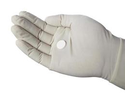piller tabletter medicin sjukvård hand handske