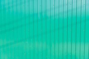 grön metall staket bakgrund, sömlös konsistens foto