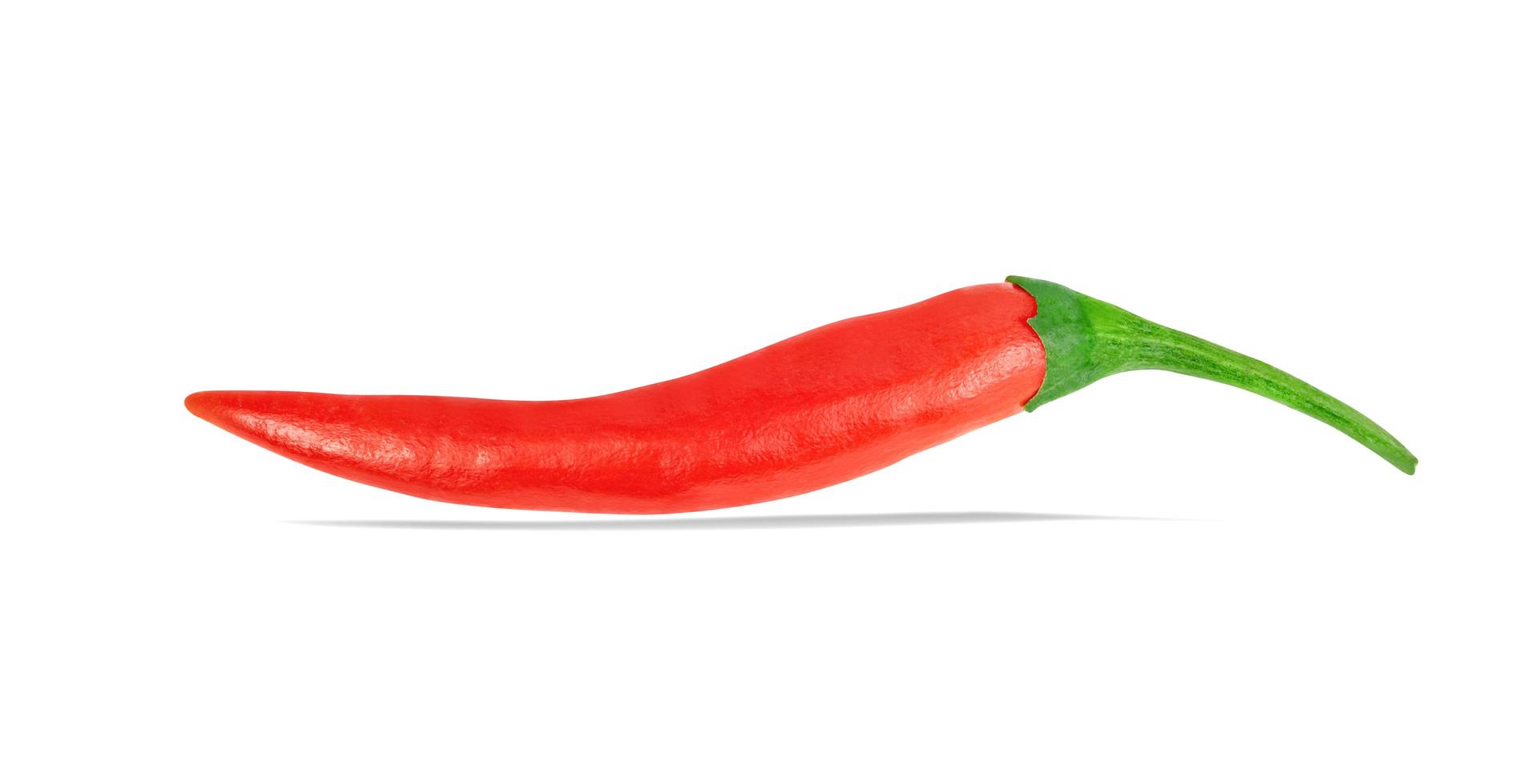 Rode chili peper geïsoleerd op een witte achtergrond, inclusief uitknippad foto
