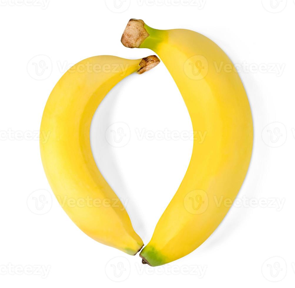 Rijpe banaan geïsoleerd op een witte achtergrond, inclusief uitknippad foto